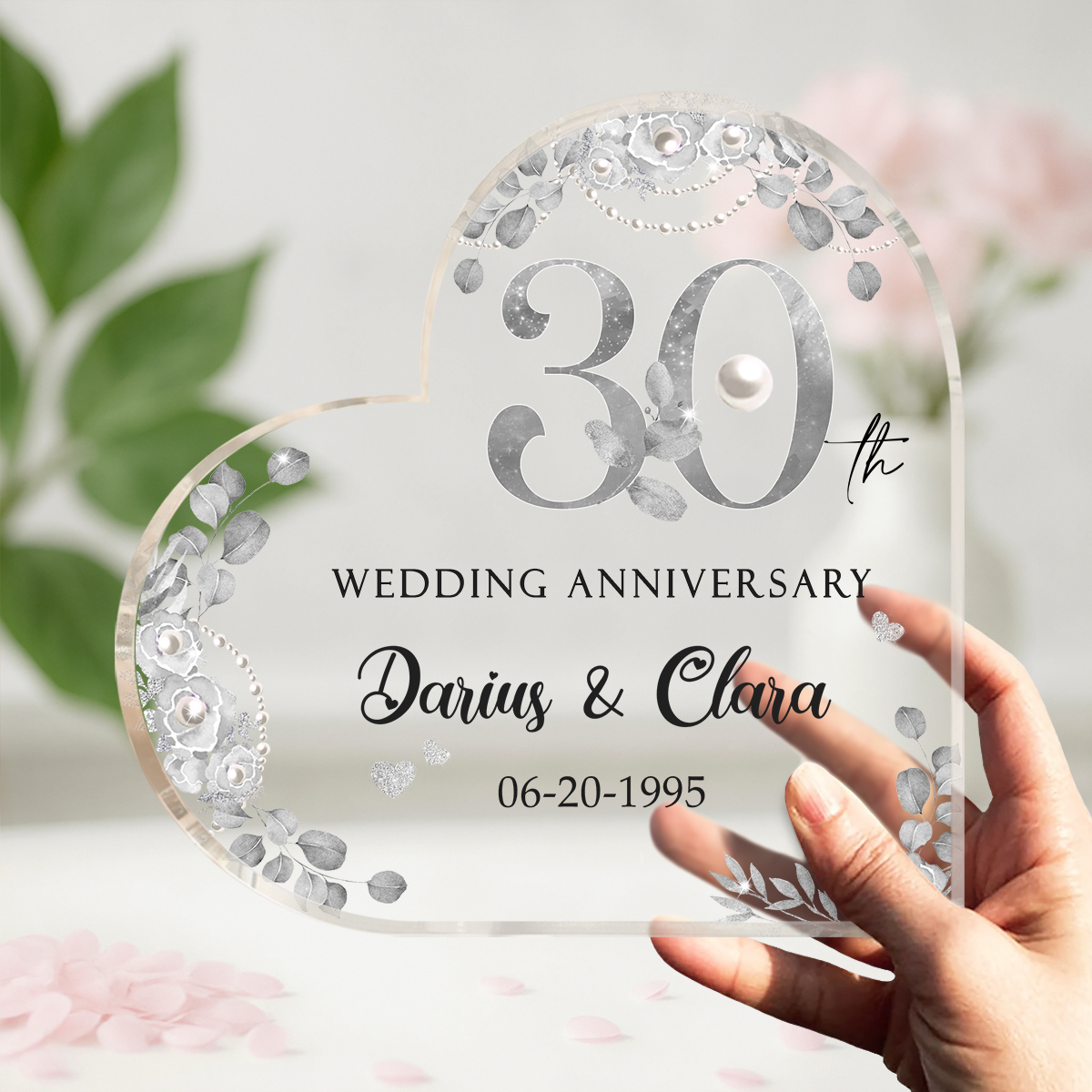 30th Wedding Anniversary Acrylic Plaque, Personalized 30 Year Aanniversary Gift, Pearl Wedding Anniversary Gifts, Thirty Year Anniversary Keepsake 1 Personalized 30 Year Aanniversary Gift, Pearl Wedding Anniversary Gifts, 30th Wedding Anniversary Acrylic Plaque, Thirty Year Anniversary Keepsake Crafted from high-quality acrylic, this stunning plaque features a timeless heart shape adorned with delicate floral designs, symbolizing growth and blossoming love over the years. The elegant silver-tone "30th" stands prominent, immediately drawing attention to this special day, while the names and wedding date are beautifully personalized for a touch that’s uniquely yours. This acrylic plaque is not just a decoration but a heartfelt reminder of the laughter, challenges, and cherished moments that have woven together the fabric of your life. Measuring just the right size, it fits perfectly on any mantle, bookshelf, or desk, serving as a daily reminder of your enduring commitment. Perfect for surprising your partner or gifting to a beloved couple, this personalized 30th wedding anniversary keepsake speaks volumes of your affection and appreciation. Ideal for anniversaries, it is a gift that will surely be treasured for years to come. Make this memorable occasion even more special with a gift that encapsulates the magic of your enduring love. Order your personalized anniversary plaque today and celebrate the beautiful milestone of 30 years together!